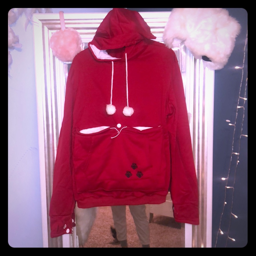 Hold your animal in your sweater? Lol